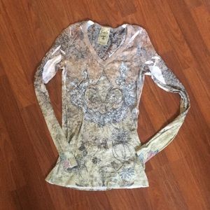 Vocal large long sleeve fleur de lis top